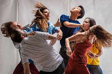 Image of dancers in movement from LOT X. Photography by Jeremy Mimnagh